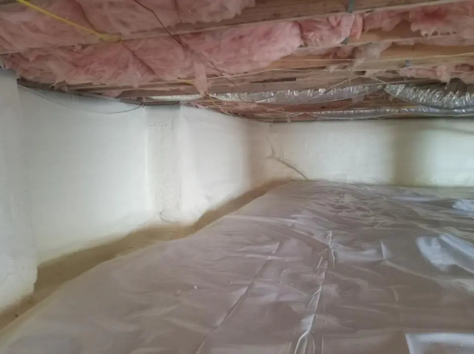 Crawl space encapsulation with closed-cell spray foam for Roof Waterproofing in New London